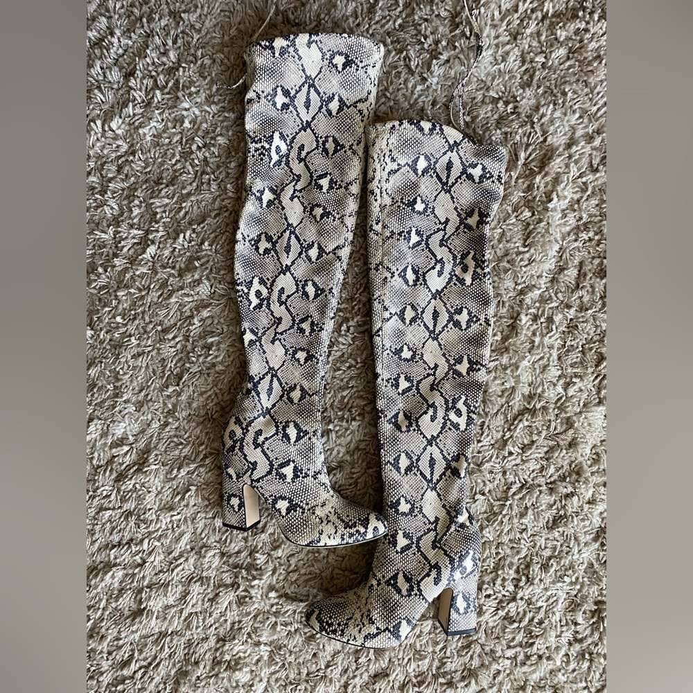 Over the knee snake boots